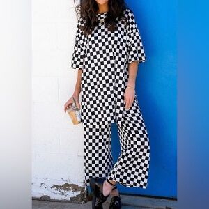 Dressed in LaLa Lex Ribbed Playsuit in Black + White Checkerboard, 2x